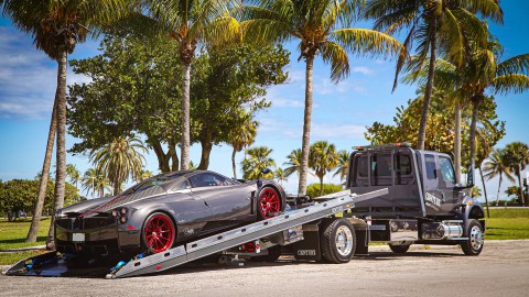 Pagani Huayra loaded on a century 12 series lcg carrier with right approach option