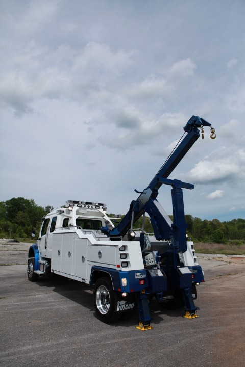 rear photo of a white and blue vulcan v-30 stretched out