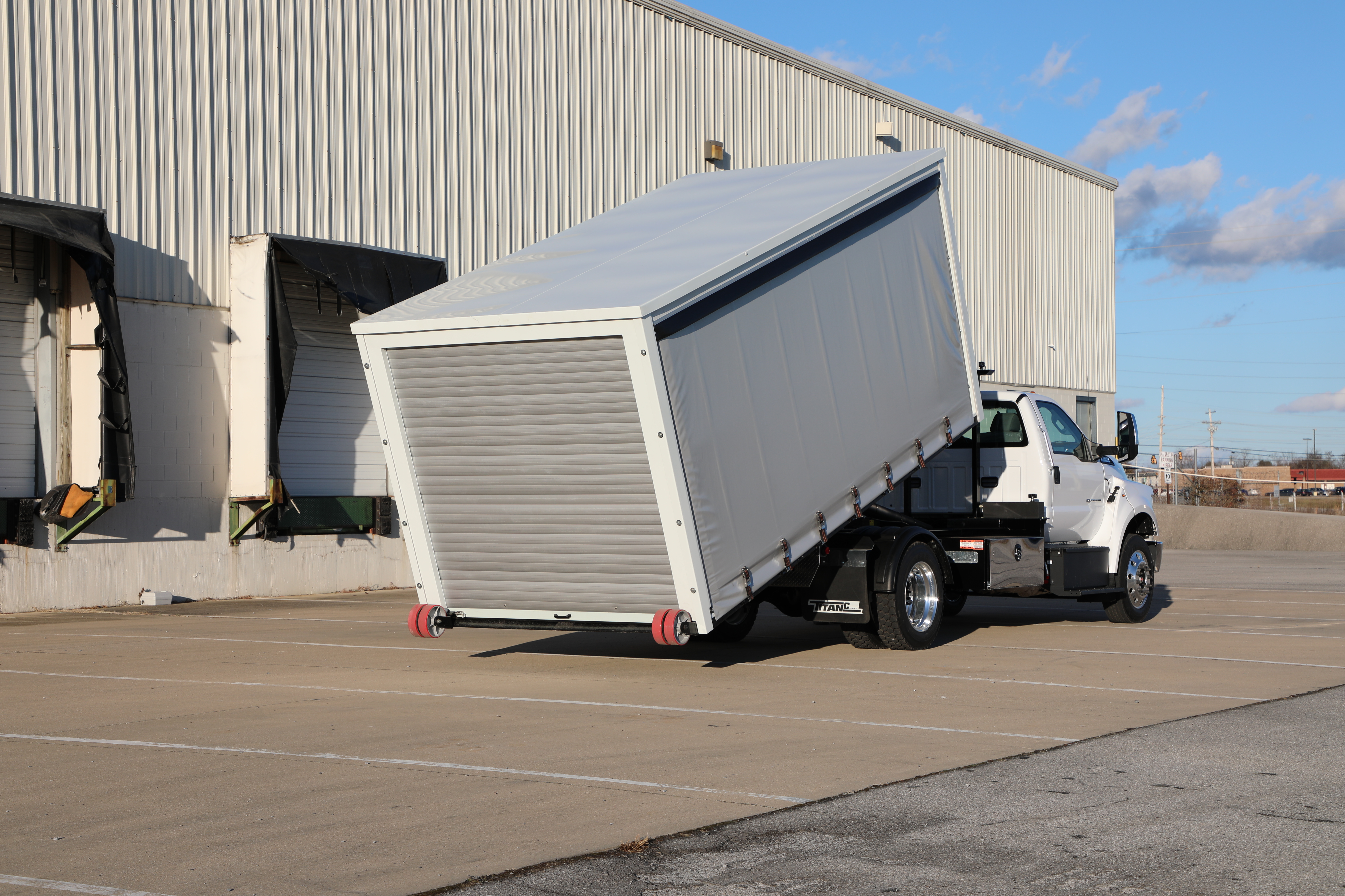 The Titan® C-Series Covered Deck unloading 1