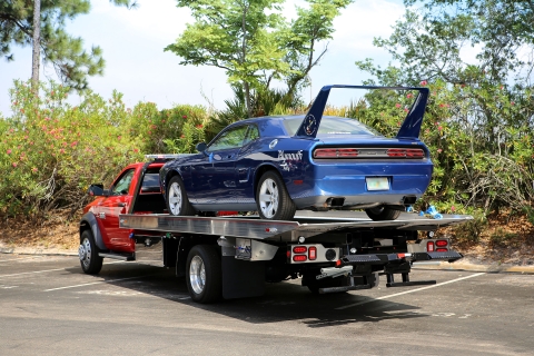 red century 10 series carrier with an aluminum bed loaded with a  Plymouth roadrunner