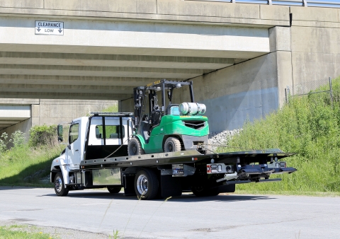 Century 12-Series LCG on a Hino 258 loaded for ultra low towing
