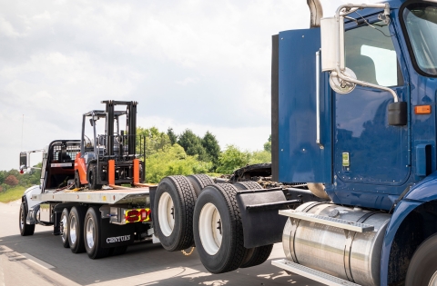Century 30 & 40 Series LCG loaded with forklift towing tandem-axle tractor