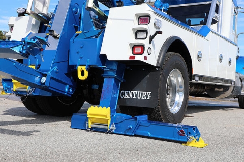 Image shows the extendable rear jack legs available on the Century®️ 3212 medium-duty wrecker.