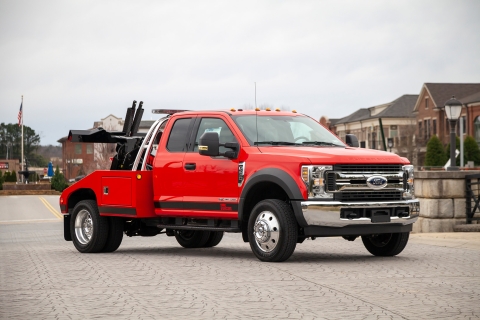 red and black vulcan 812 intruder 2 wrecker on a ford f550 chassis