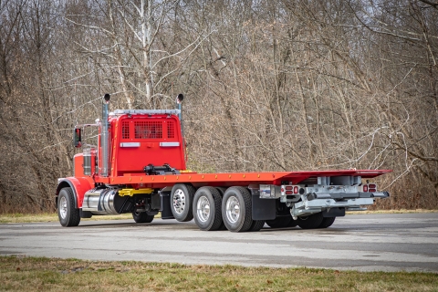 Image shows a rear view of a Chevron 30-Series LCG industrial carrier with the bed stowed.