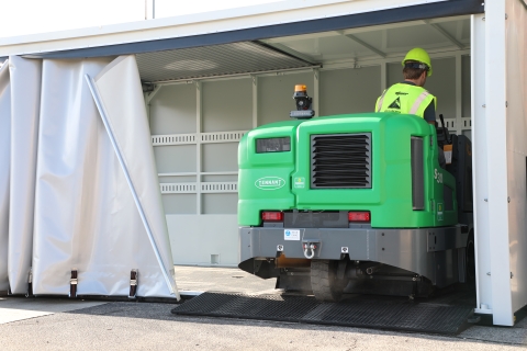 loading a sweeper using the side ramps on a titan c series