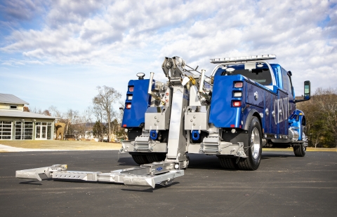 Century 3212 16-Ton Wrecker with multiple wheel grid holder options for the underlift.