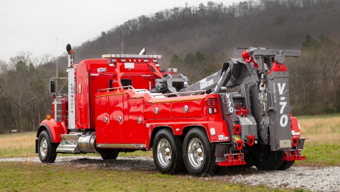 red and gray vulcan v70 on a kenworth w900