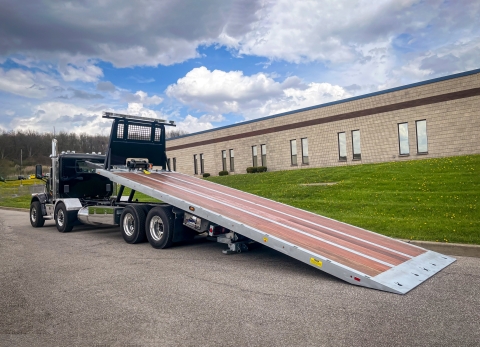 Image shows a Century 40-Series LCG with the bed deployed