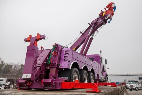 Image shows a Century 1150 rotator with it's dual H-beam outriggers extended for maximum stability during heavy-recoveries.