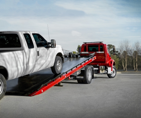 Century 16-Series LCG Carrier loading a work truck