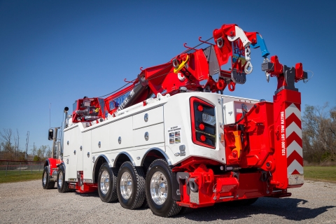 white and red century m100 on a peterbilt 389 chassis