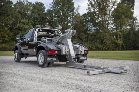 Photo features a Miller Industries light-duty autoloader with a generation two wheellift.