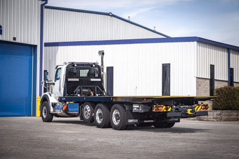 Rear view of a century R30 industrial carrier from Miller Industries.