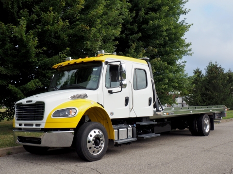 Century 16-Series LCG Carrier on a Freightliner double crew cab truck chassis