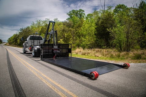 Titan C-Series Roll off unit with bed back on ground