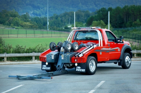 Image showing a Vulcan®️ 810 auto-loader with a generation one style wheel lift lowered and extended in the recovery position.