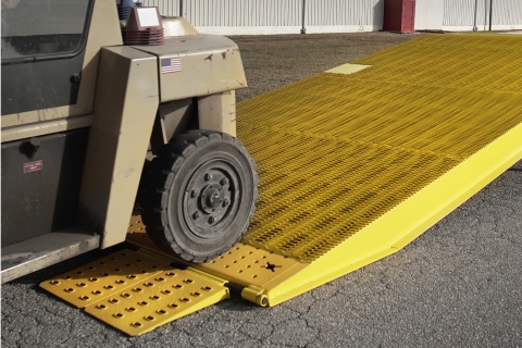 fork lift driving onto yard ramp