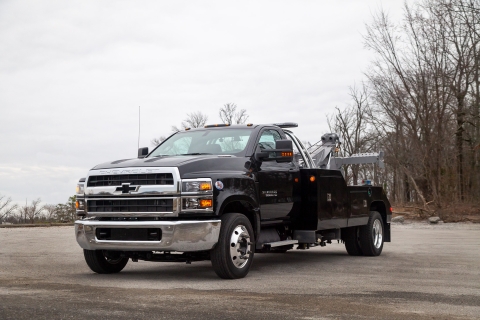 front of a black and gray century 2465 on a chevrolet hd chassis