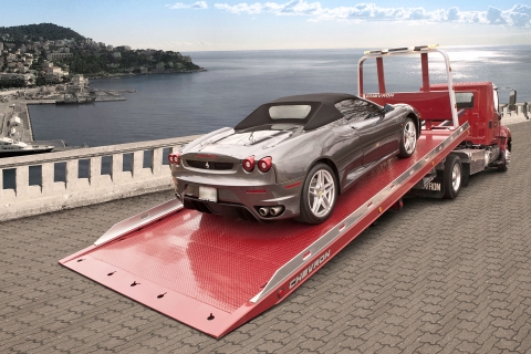 gray ferrari loaded on a red chevron 12 series lcg carrier with loadrite option