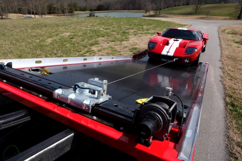 winching up a red ford gt onto the deck of a century 12 series lcg with right approach option