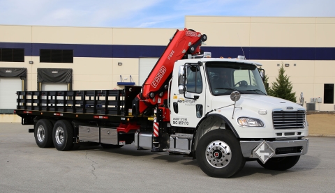 titan stake bed truck with crane boom fassi