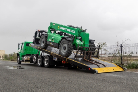 titan zla on green Freightliner m2 chassis loaded bed at angle