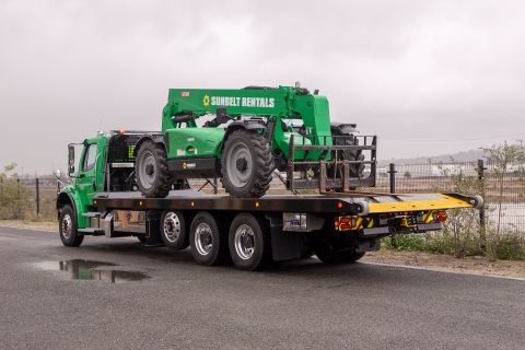 titan zla on green Freightliner m2 chassis bed stowed loaded with equipment