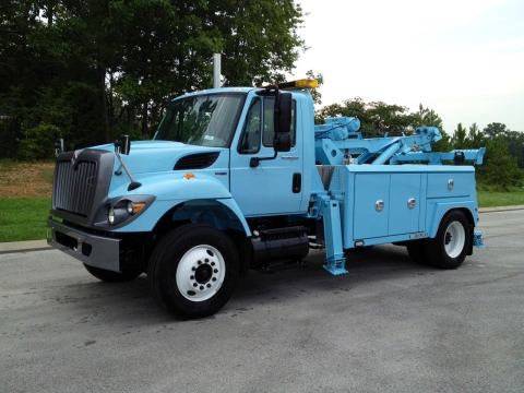 The Holmes 600R can be mounted on a variety of chassis.  This is a front view of an International truck chassis