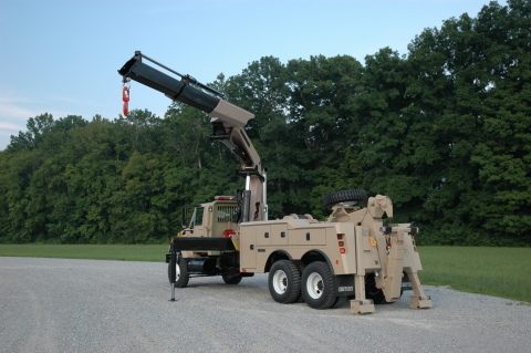 Driver's side view of the 4024 with the recovery arm at deployed on the drivers side.