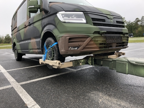 Century 5230 towing a military van using the underlift wheelgrids and drop in LArm retainers