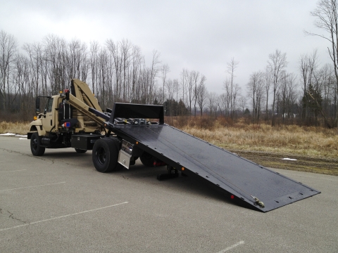 Rea view of a LD Military carrier with the bed extended