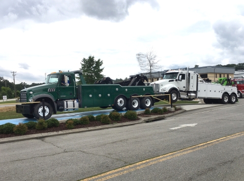 Image showing a Century 9055 towing another heavy-duty wrecker and clearing the weight scales