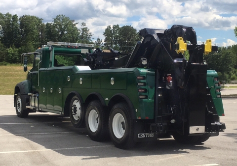 Rear driver's side view of a Century 9055 wrecker.