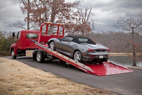 red chevron 12 series lcg loadrite with ferrari loaded on deck