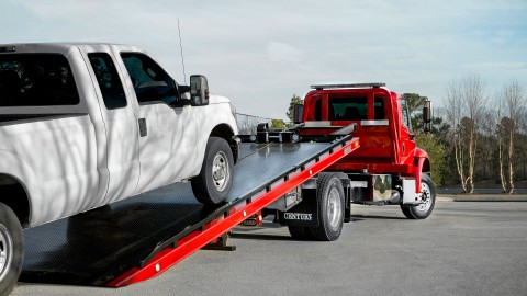 red 16 series lcg carrier loading truck