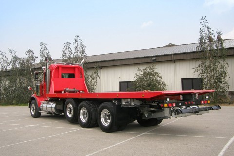 red 40 series industrial carrier on a peterbilt 389 chassis
