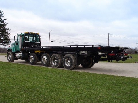 century 40 series industrial carrier on a green peterbilt chassis