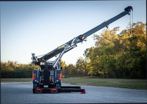 Century M65 on a black Peterbilt 589 Simard twin-steer chassis rear stretched off the side