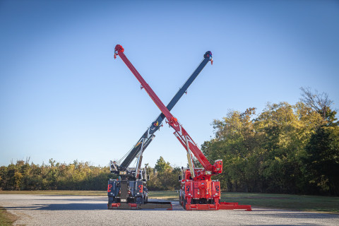 Two Century M65 units on a red Kenworth W900 and a black Peterbilt 589 twin-steer chassis rear booms crossed