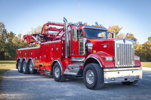 Century M65 on a red Kenworth W900 twin-steer chassis front