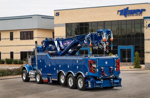 blue century m100 rotator on a kenworth w900 chassis