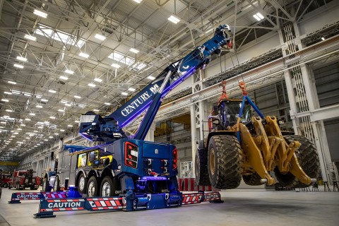 century m100 rotator lifting a large piece of equipment