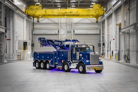 front of a blue century m100 on a kenworth w900 chassis