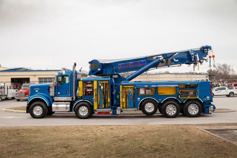 drivers side of the century m100 with toolboxes open