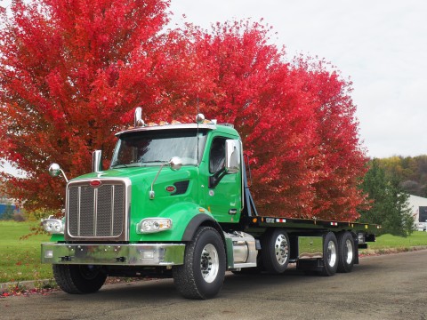 This image shows a Century R30 industrial carrier mounted on a Peterbilt motors truck chassis.