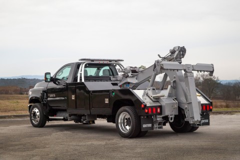 black chevy with a century 2465 wrecker