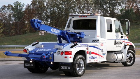 white and blue century 612 on a freightliner m2 chassis