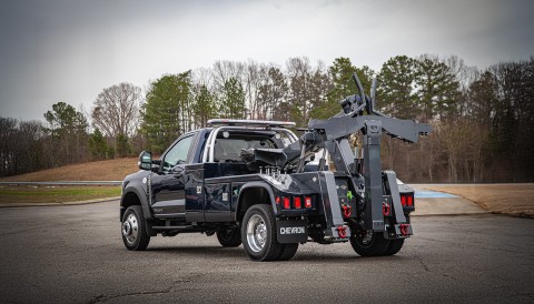 Dark blue Chevron 408 wrecker on a Ford F-550 chassis