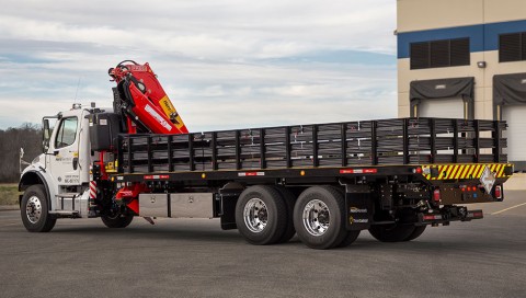 titan cran boom stake bed unit on a freightliner m2 chassis